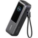Anker Zolo A1695 25000mAh 165W power bank front view showing smart LCD display, 4 ports, and retractable cable